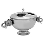 4 Bottle Elephant Wine Cooler in silver aluminium featuring sculpted elephant head handles and a fitted lid on a drinks station