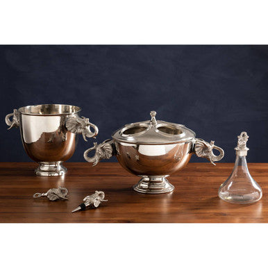 4 Bottle Elephant Wine Coolers in silver aluminium featuring sculpted elephant head handles and a fitted lid on a drinks station