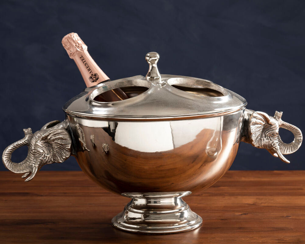 4 Bottle Elephant Wine Cooler in silver aluminium featuring sculpted elephant head handles and a fitted lid on a drinks station