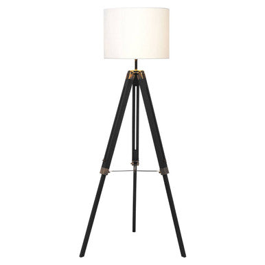 Malvern Black Wood Tripod Floor Lamp with white linen shade and black pine wood tripod legs in a modern living room