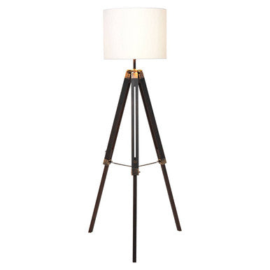 Malvern Black Wood Tripod Floor Lamp with white linen shade and black pine wood tripod legs in a modern living room