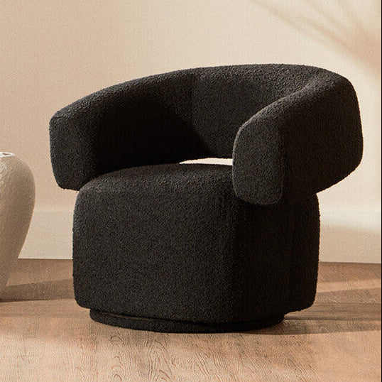 Oliveto Black Bouclé Curved Swivel Armchair with 360 degree revolving base and modern cut-out back design