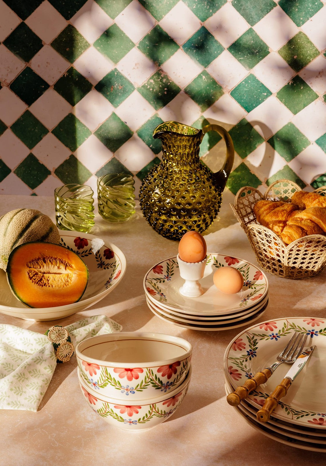 Hand-painted in Portugal since 1884, the Camilla Green Garland Cereal Bowl brings artisan charm to your everyday table. A beautiful gift idea.