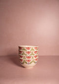 Hand-painted in Portugal since 1884, the Camilla Green Garland Cereal Bowl brings artisan charm to your everyday table. A beautiful gift idea.