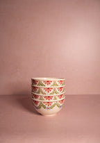 Hand-painted in Portugal since 1884, the Camilla Green Garland Cereal Bowl brings artisan charm to your everyday table. A beautiful gift idea.